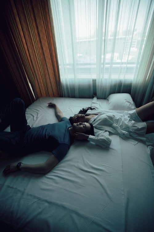 Couple lying on the bed
