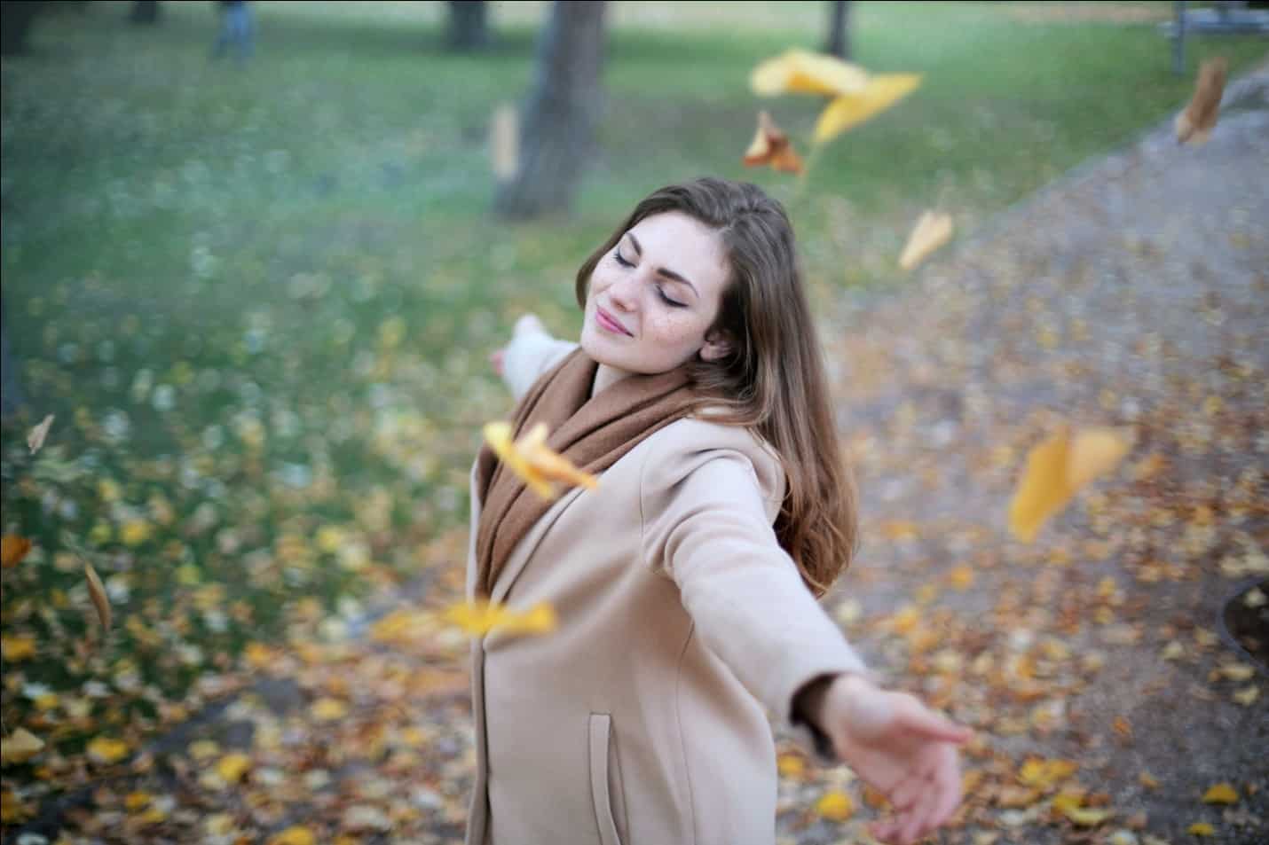 woman twirling in happiness